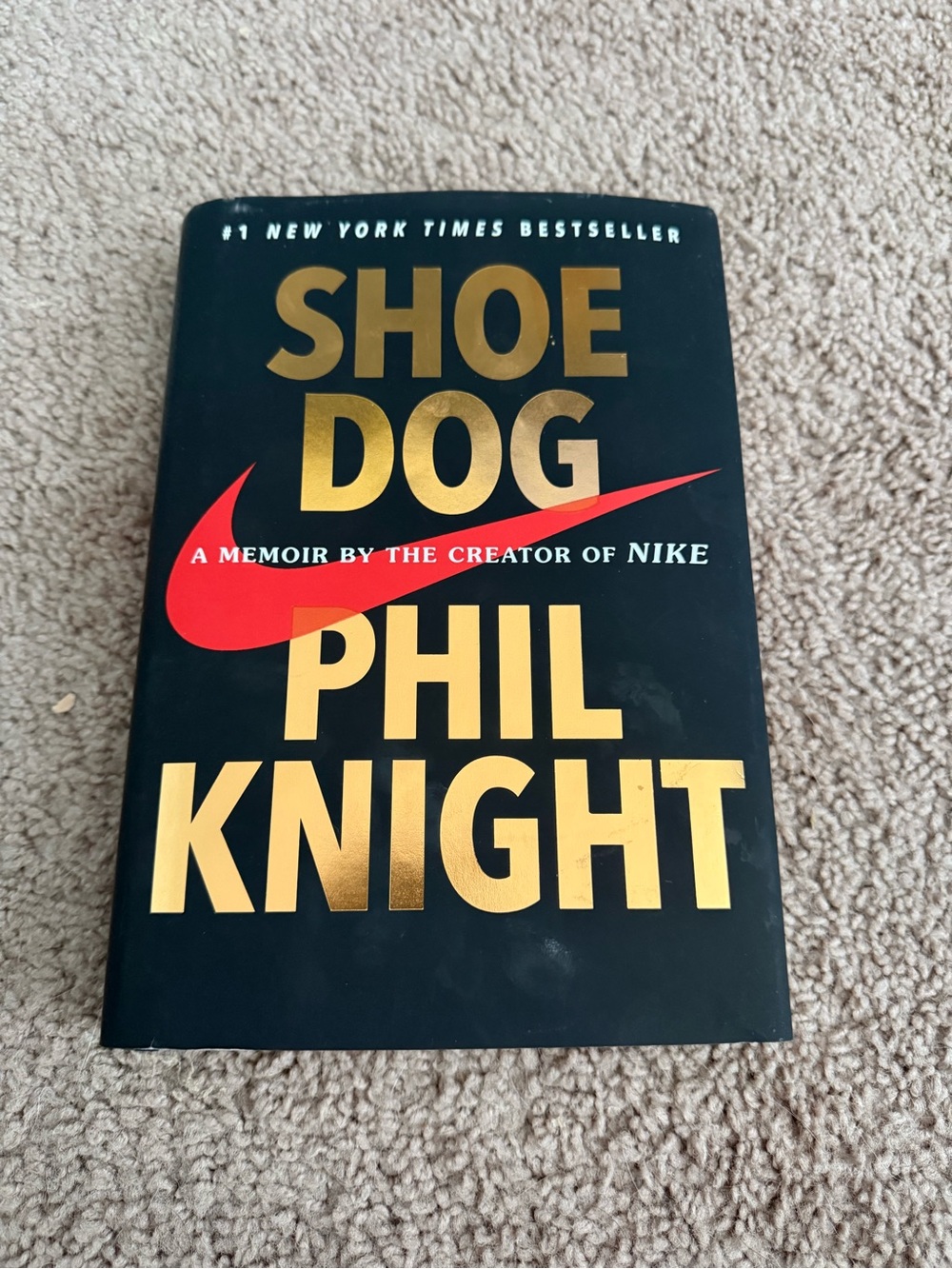 Nike Shoe Dog Hardcover — Black with Red and Gold Lettering